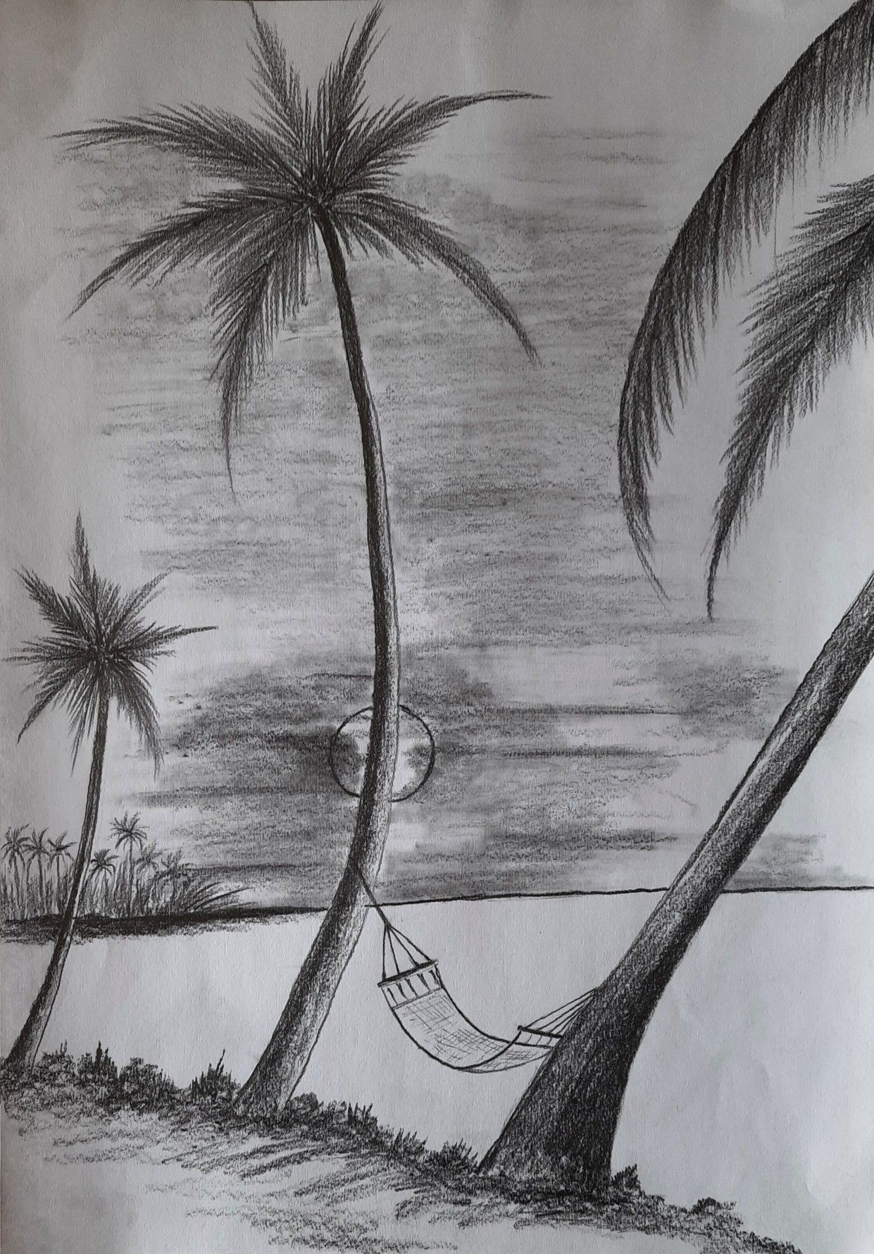 Tranquil Sunset with Hammock and Palm Trees