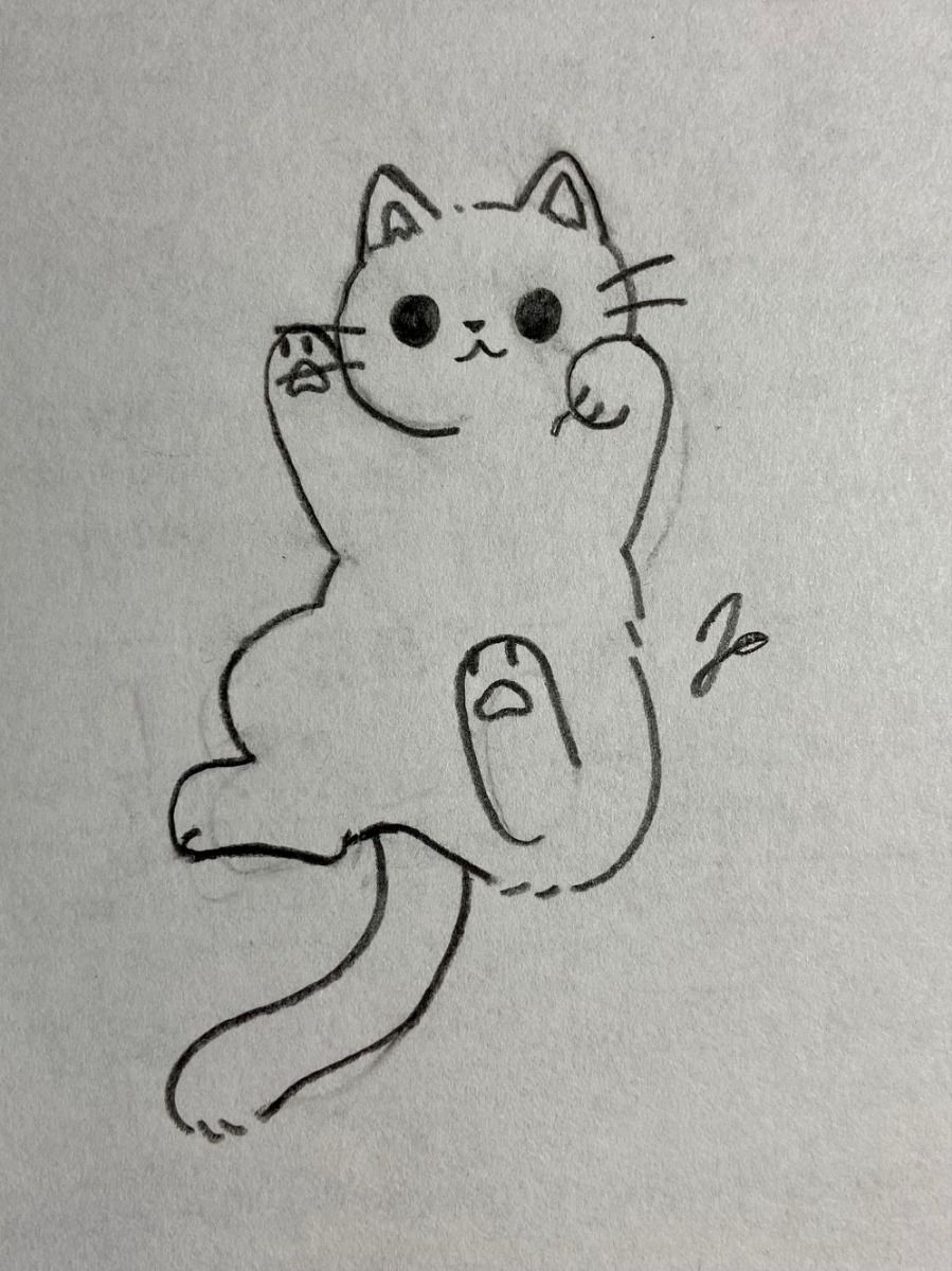Adorable Cat in Playful Pose