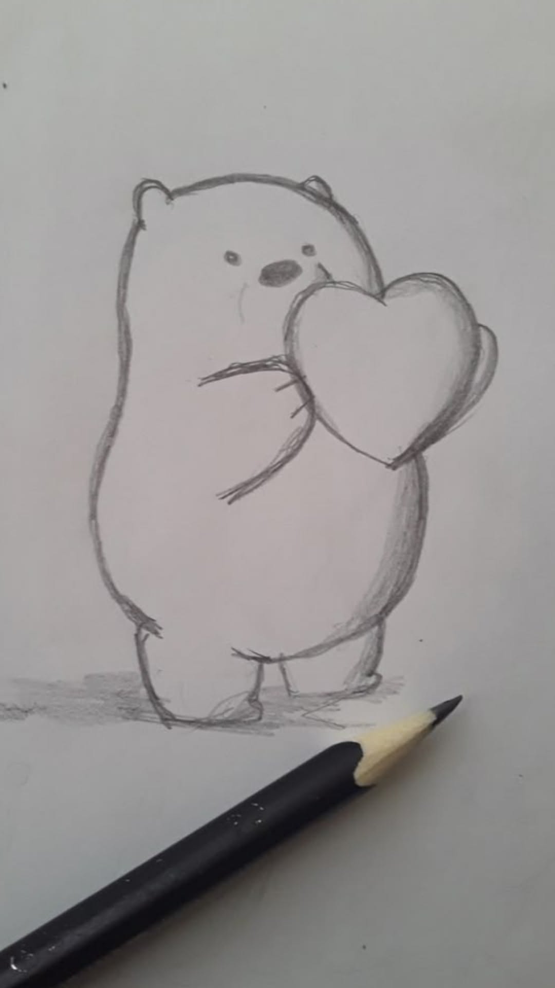 Adorable Bear Holding a Heart