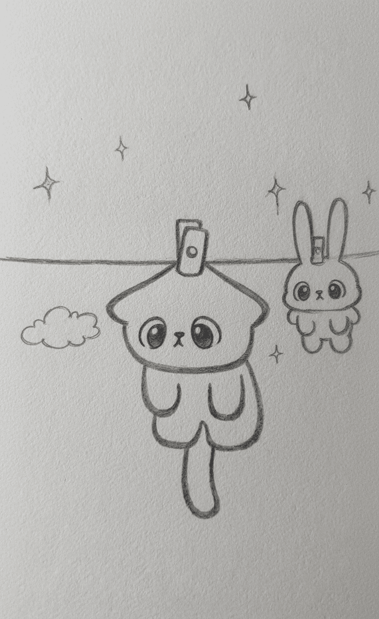 Adorable Cat and Bunny Hanging on a Clothesline