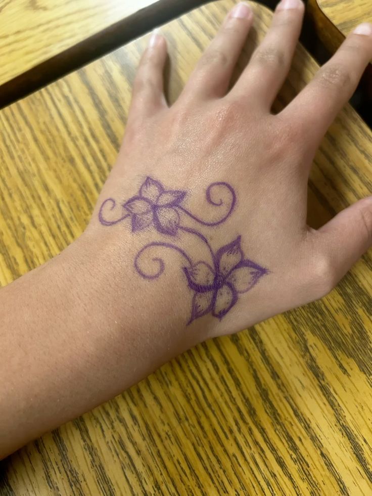 Elegant Swirling Floral Design with Pen
