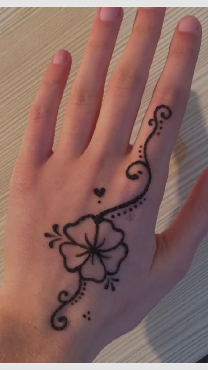 Elegant Flower with Swirls and Dots