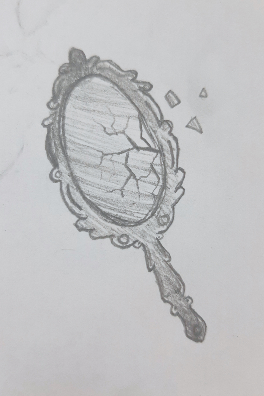 Broken Mirror with Shattered Glass Details