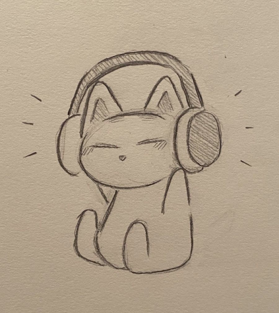 Cute Cat with Headphones Enjoying Music