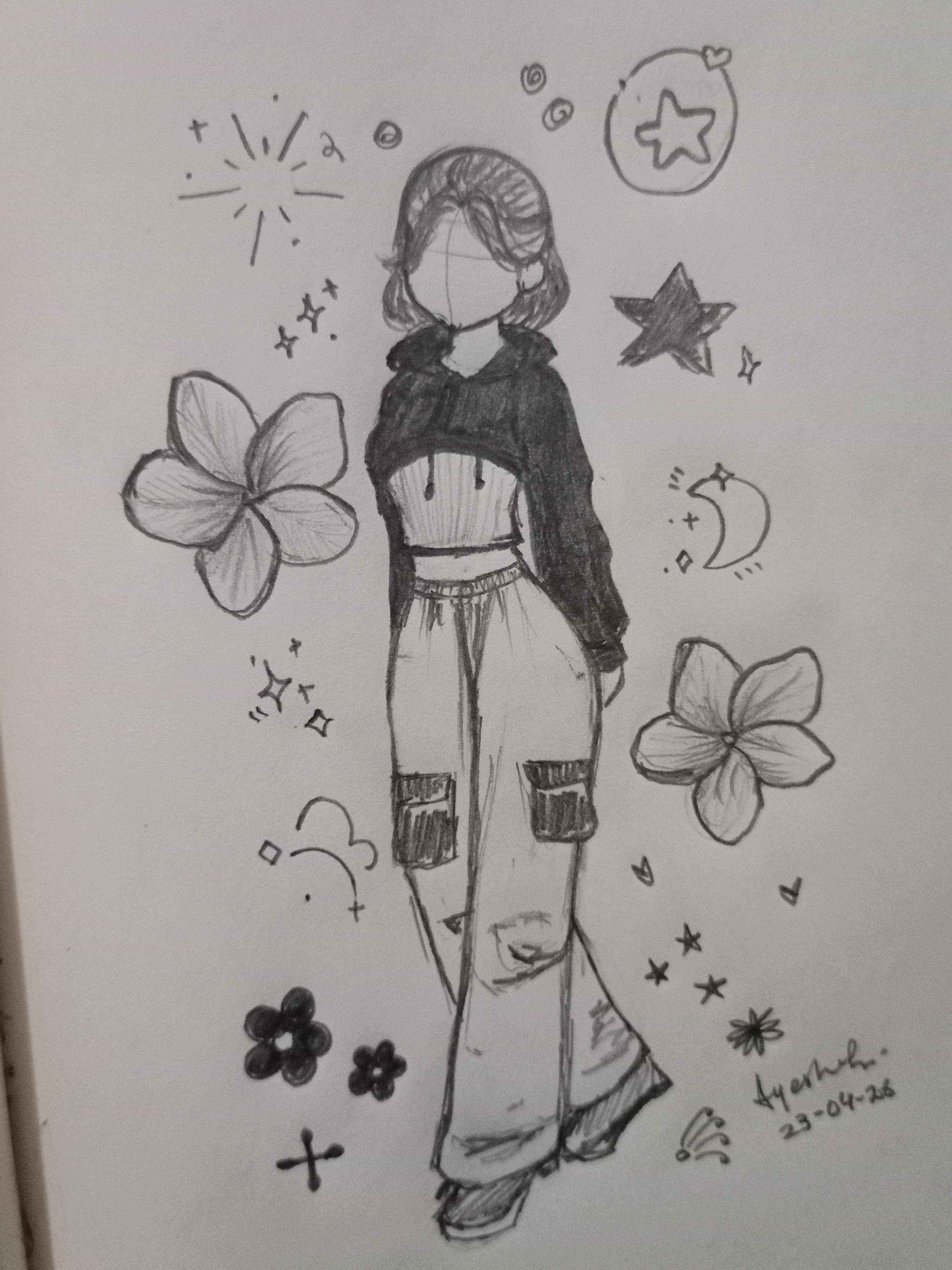 Girl in Cropped Hoodie and Stylish Pants with Floral Accents
