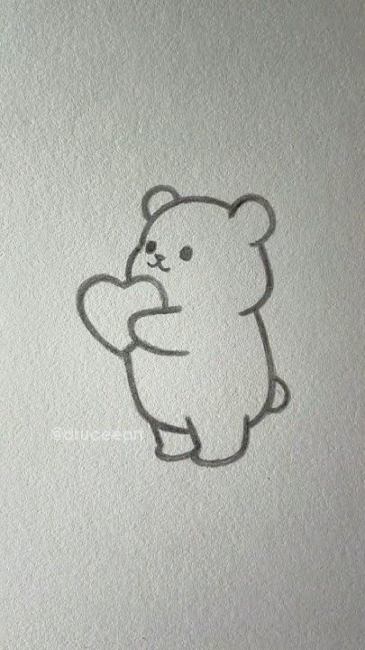 Adorable Bear Holding a Heart