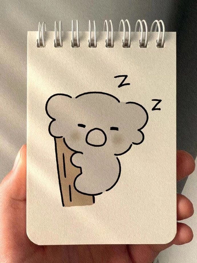 Adorable Koala Sleeping on Tree