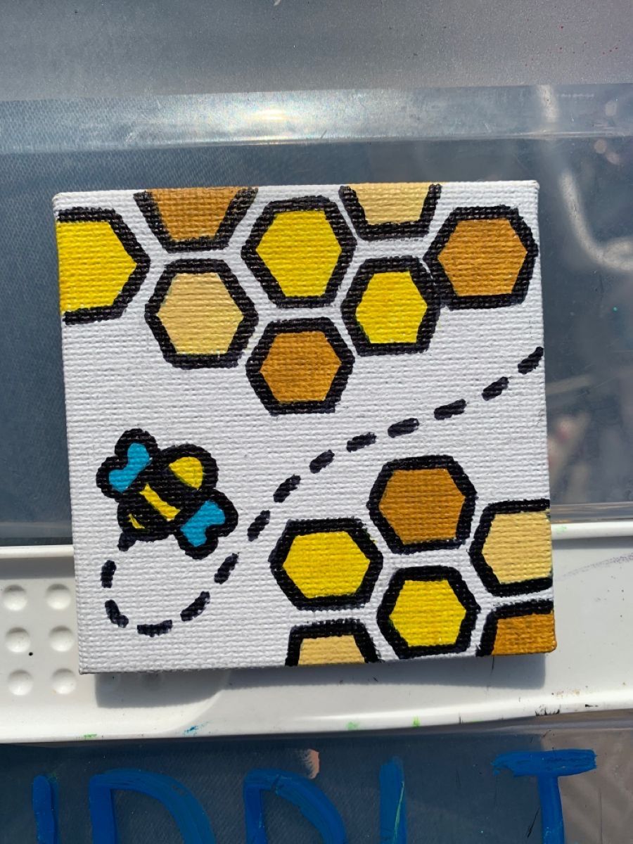 Cheerful Bee Over Honeycomb