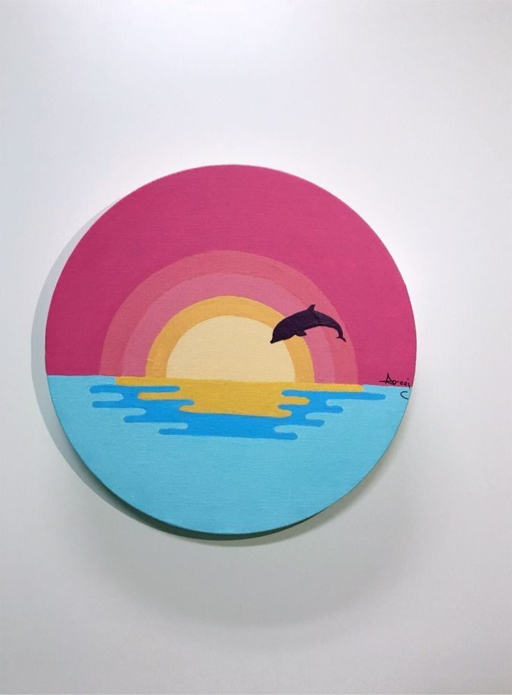 Vibrant Dolphin Jumping at Sunset