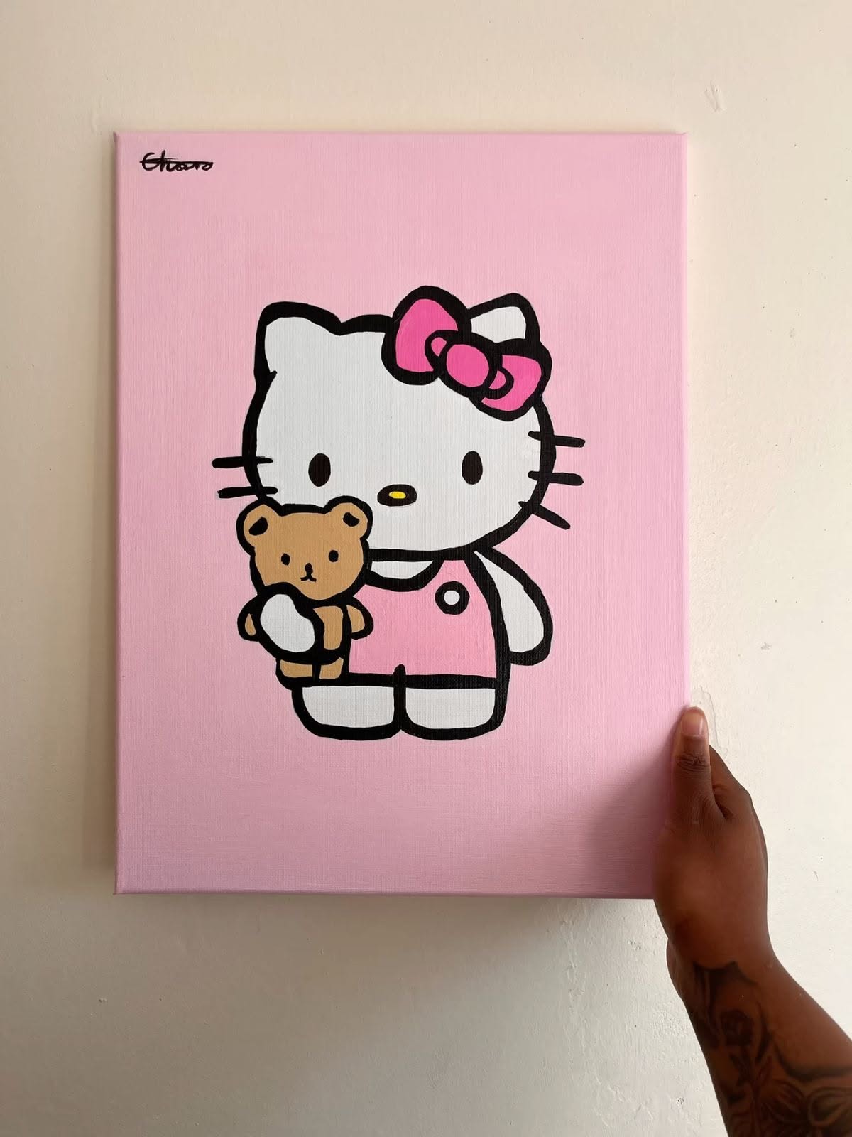Holding a Teddy Bear with Pink Background