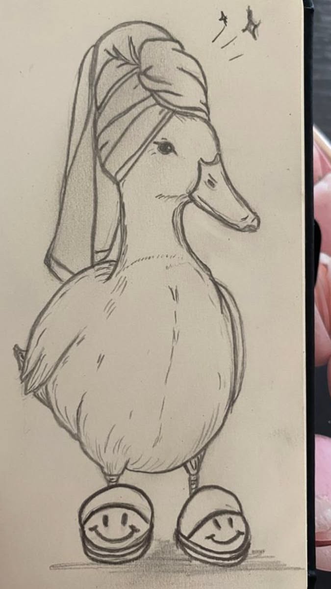 Adorable Duck in a Towel and Slippers