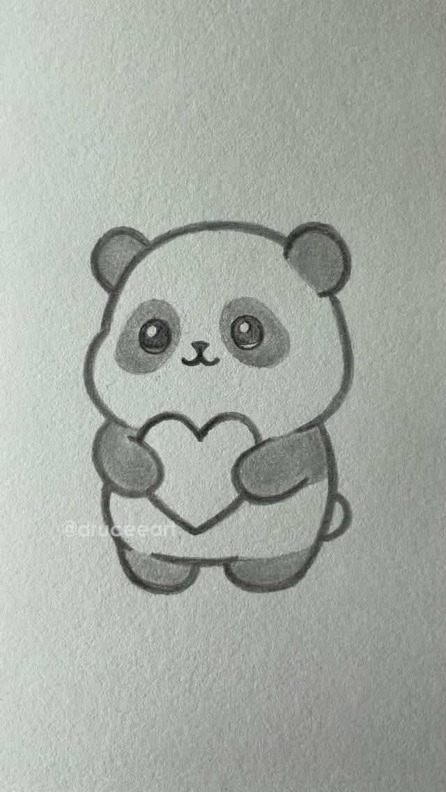 Adorable Panda Holding a Heart