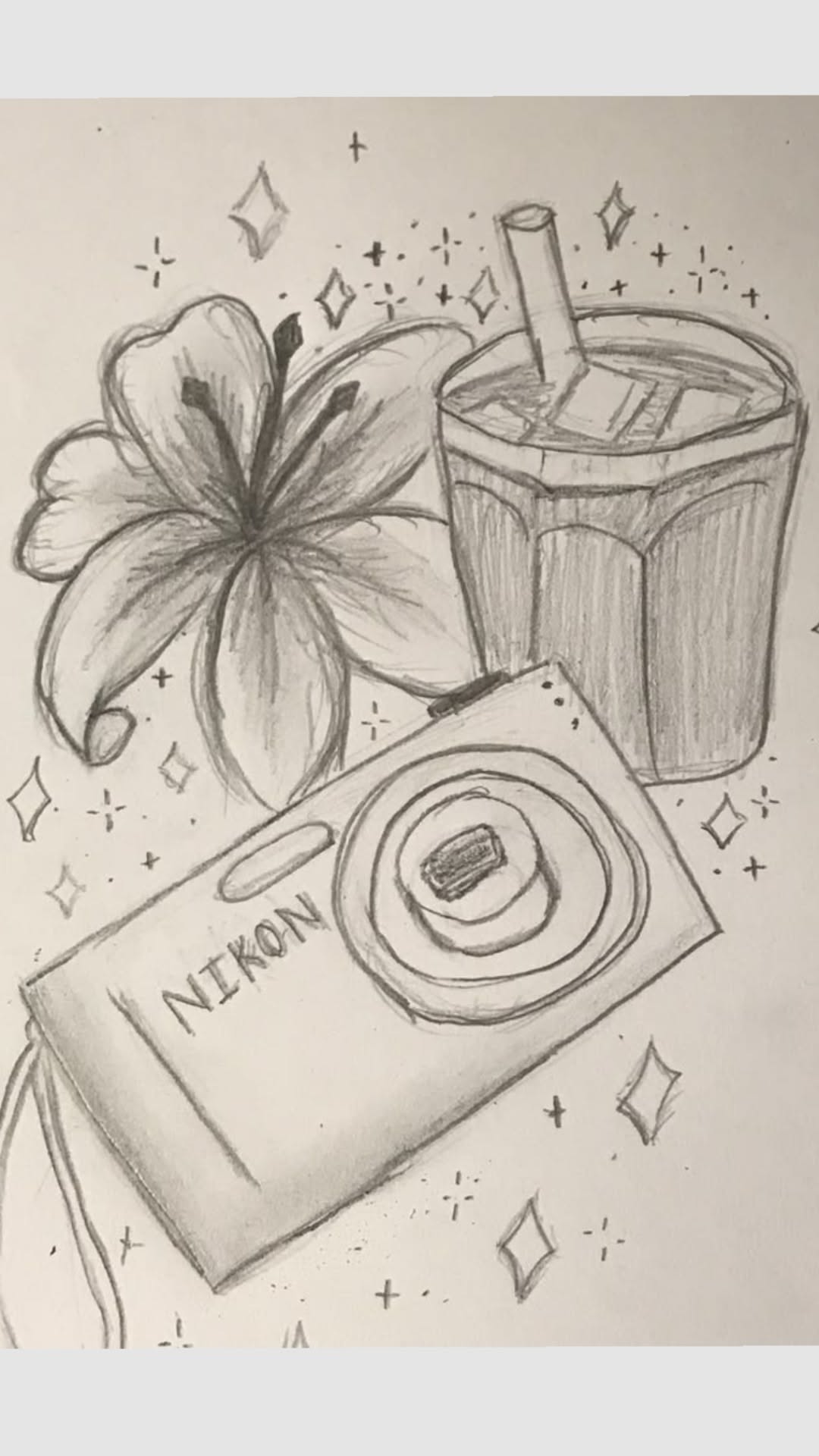 Camera with Flower and Drink
