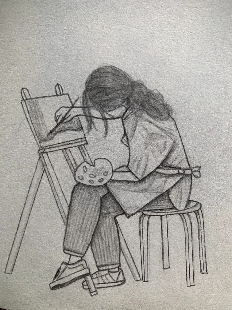 Dedicated Artist Working on a Creative Project