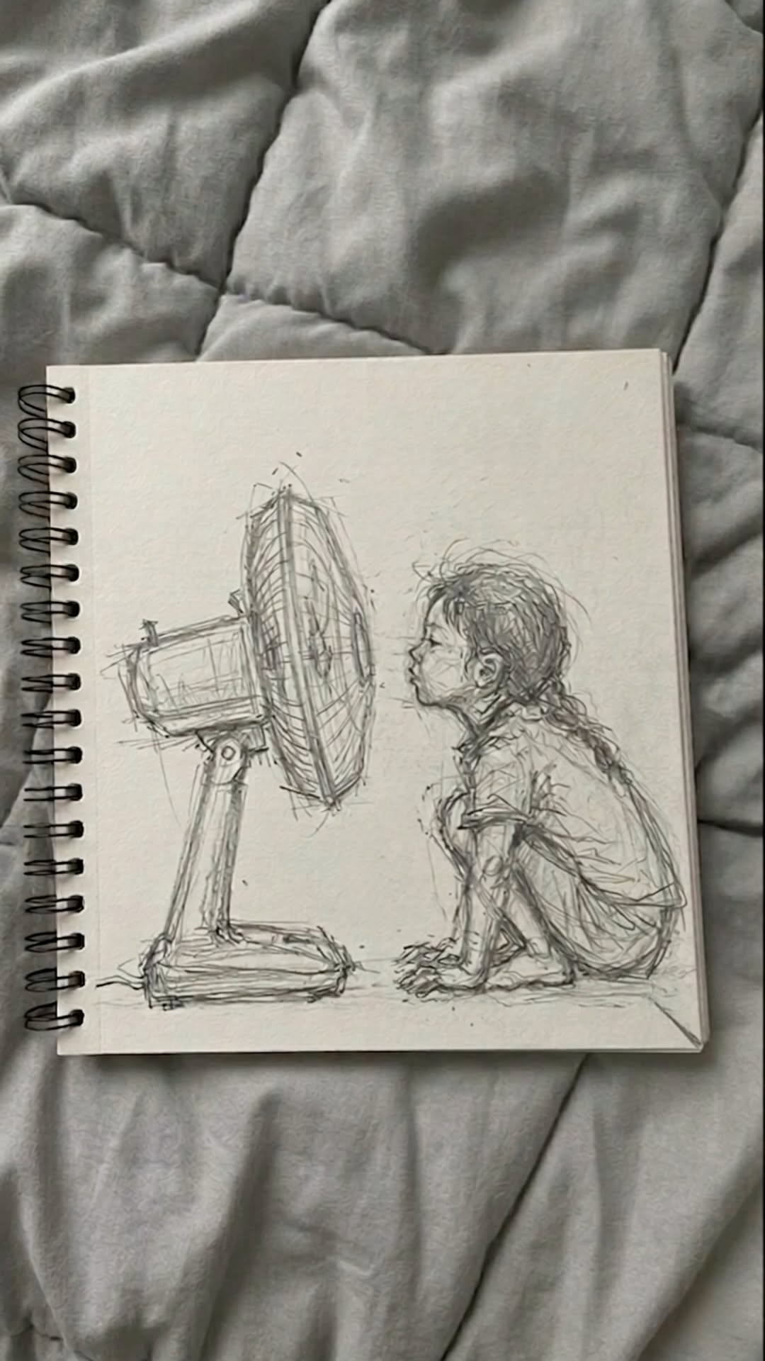 Whimsical Child Interacting with a Fan