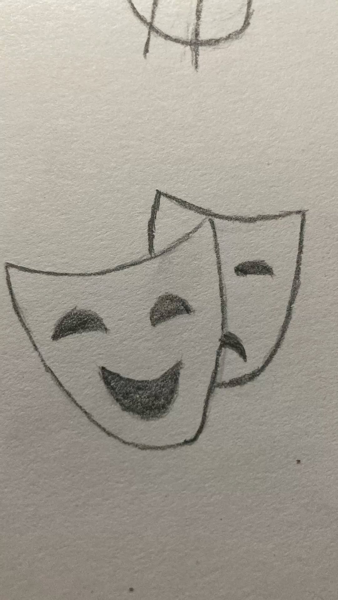 Classic Theater Masks with Smiling and Frowning Expressions