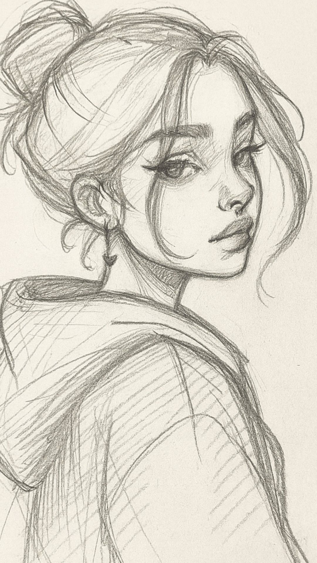 Stylish Girl with a Bun in a Hoodie
