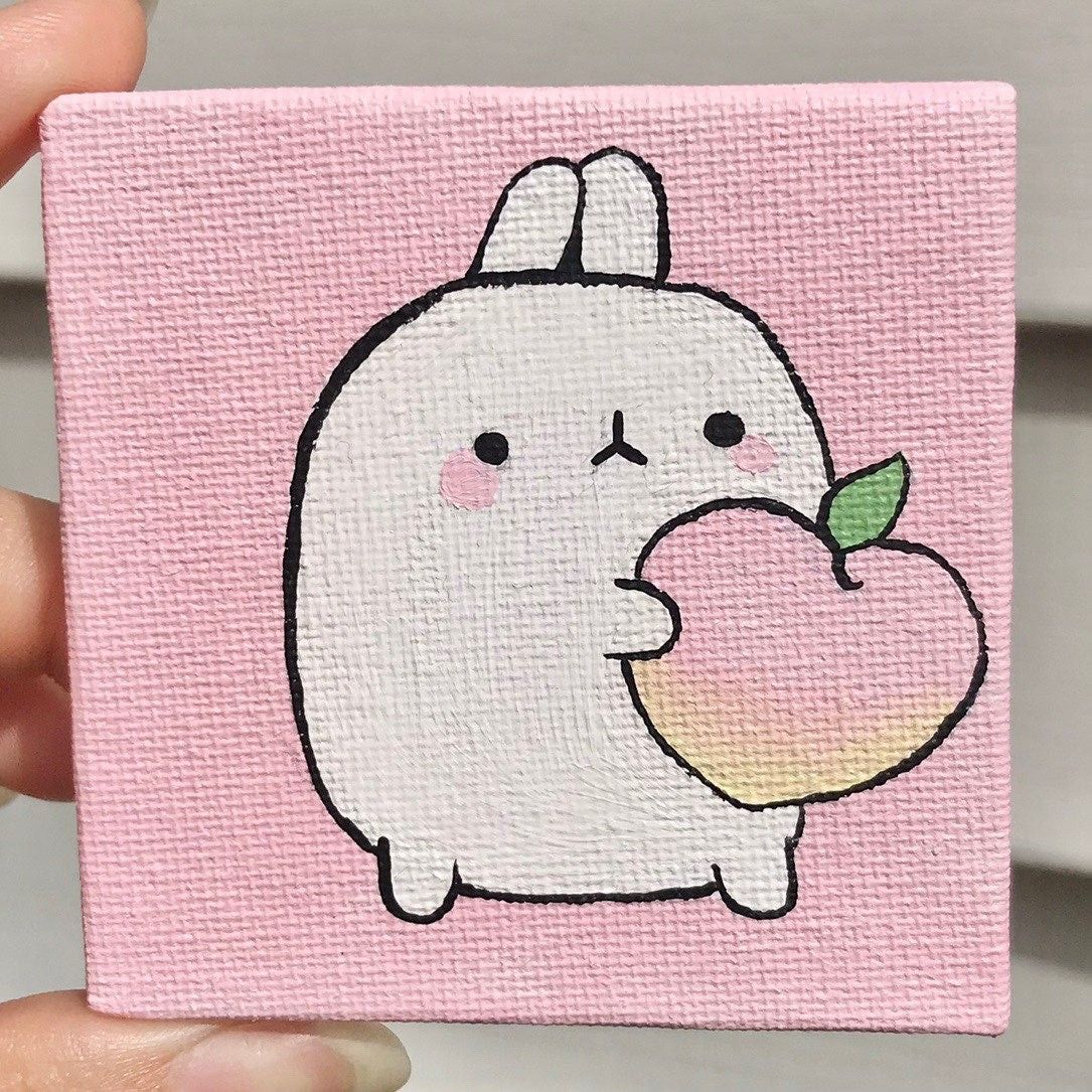 Adorable Bunny Holding a Peach