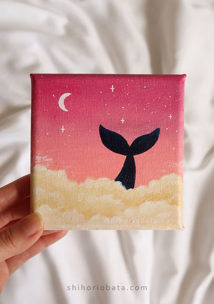 Cute Whale Tail Against a Sunset Sky
