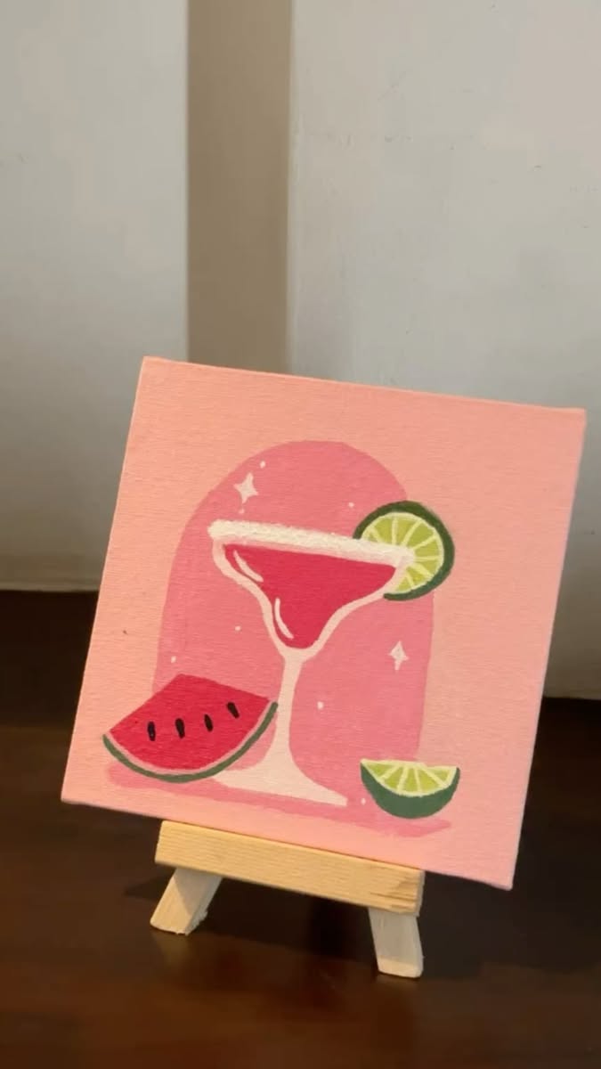 Vibrant Pink Cocktail with Watermelon Slice