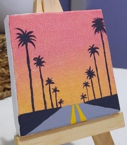 Vibrant Sunset Road with Palm Trees